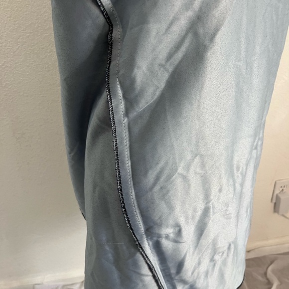 Open denim coat in blue with white lace and a hood - Picture 9 of 10